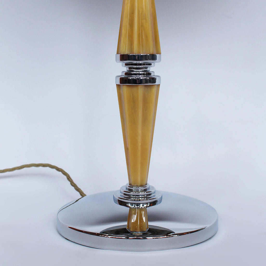 A pair of large Art Deco dome lamps with fluted bakelite stems and chromed metal domes at Jeroen Markies