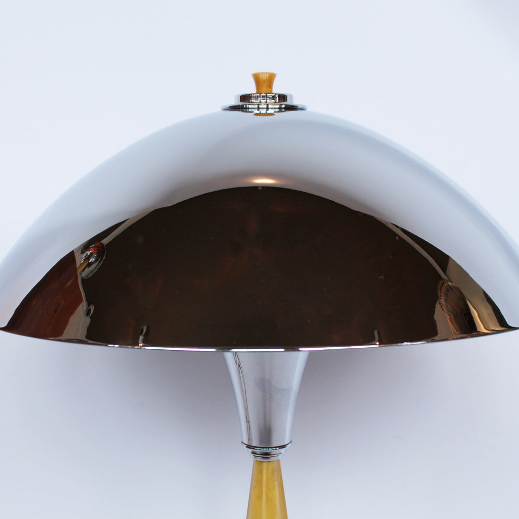 A pair of large Art Deco dome lamps with fluted bakelite stems and chromed metal domes at Jeroen Markies