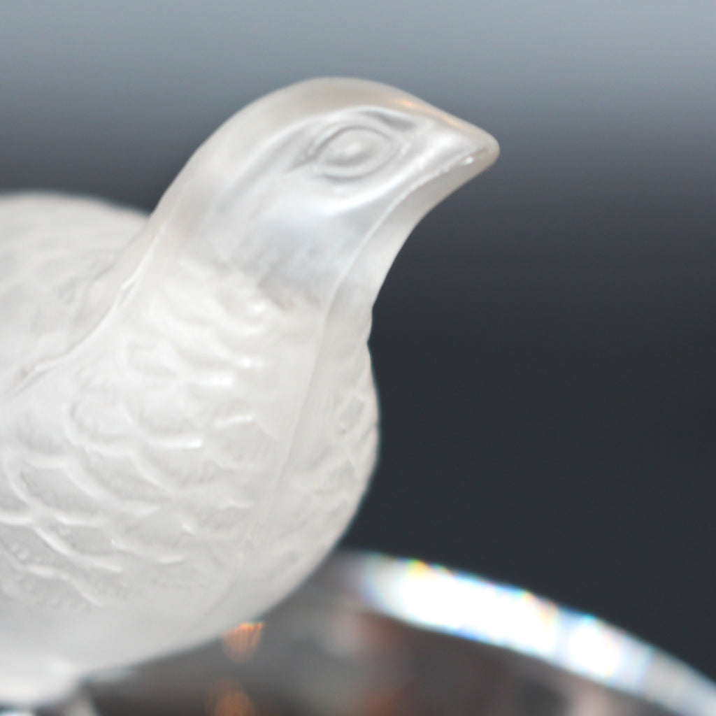 Detailed crystal ring dish by Lalique. Clear dish base topped with a frosted crystal Partridge. Signed to base at Jeroen Markies.