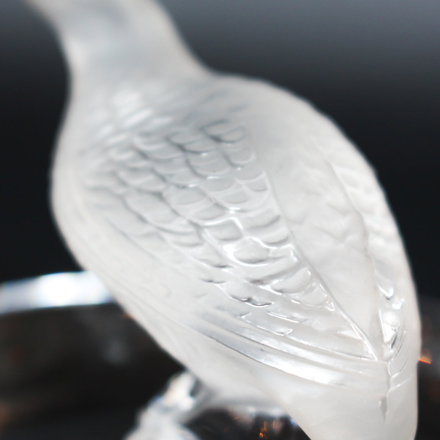 Detailed crystal ring dish by Lalique. Clear dish base topped with a frosted crystal Partridge. Signed to base at Jeroen Markies.