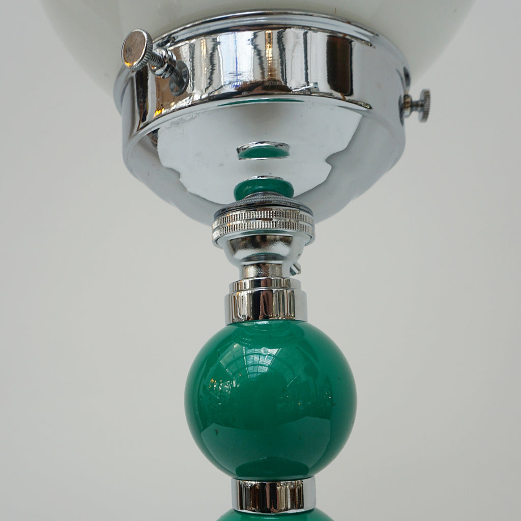 An Art Deco table lamp. Green bakelite balls with chromed banding to stem. Set over stepped circular base - Jeroen m