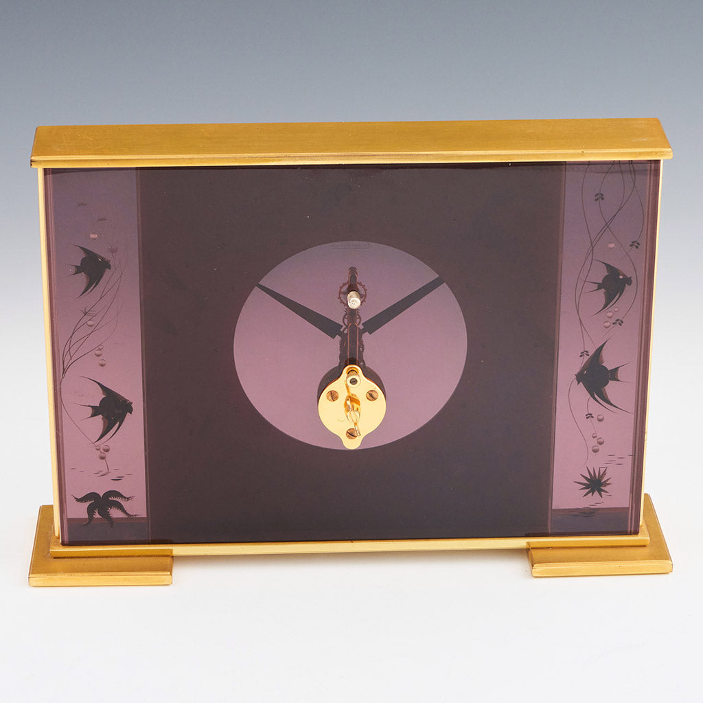 Mid century mantel clock by Jaeger-LeCoultre with brass fish decoration and a central square dial with a skeletonised 8 day movement