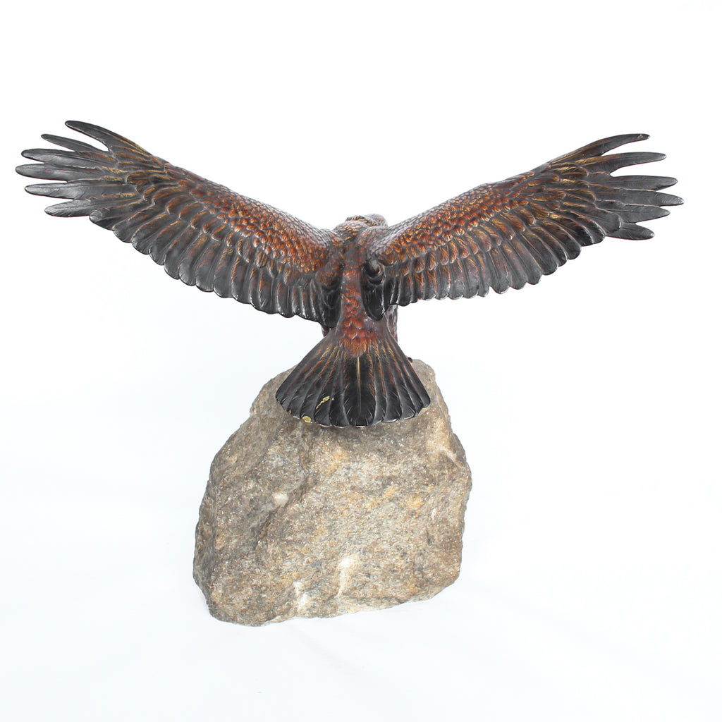 A bronze study of an eagle about to take flight with its wings outspread on the edge of a naturalistic rocky outcrop with excellent colour and fine hand finished detail. Signed with the Bergman ‘B’ to underside of tail at Jeroen Markies.