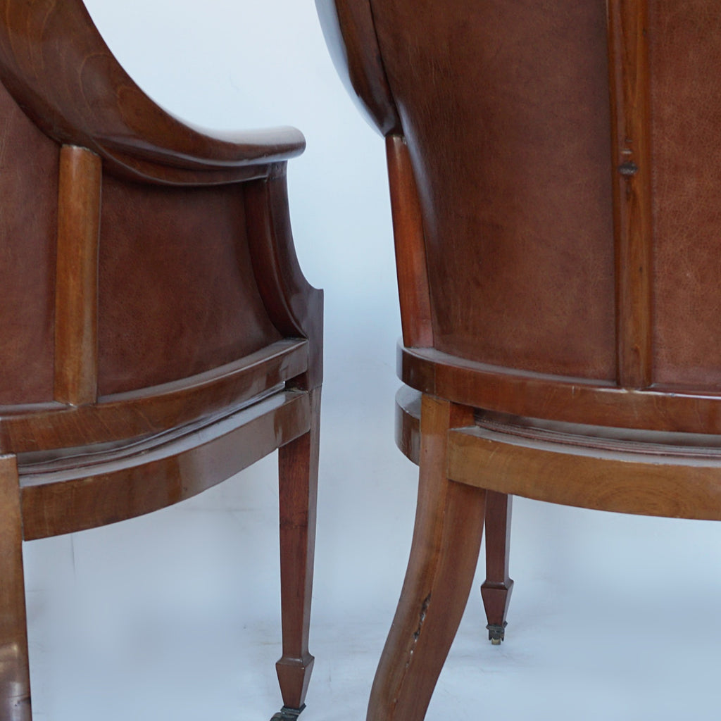A Pair of Edwardian Armchairs Re-Upholstered in chestnut leather - Jeroen Markies Art Deco