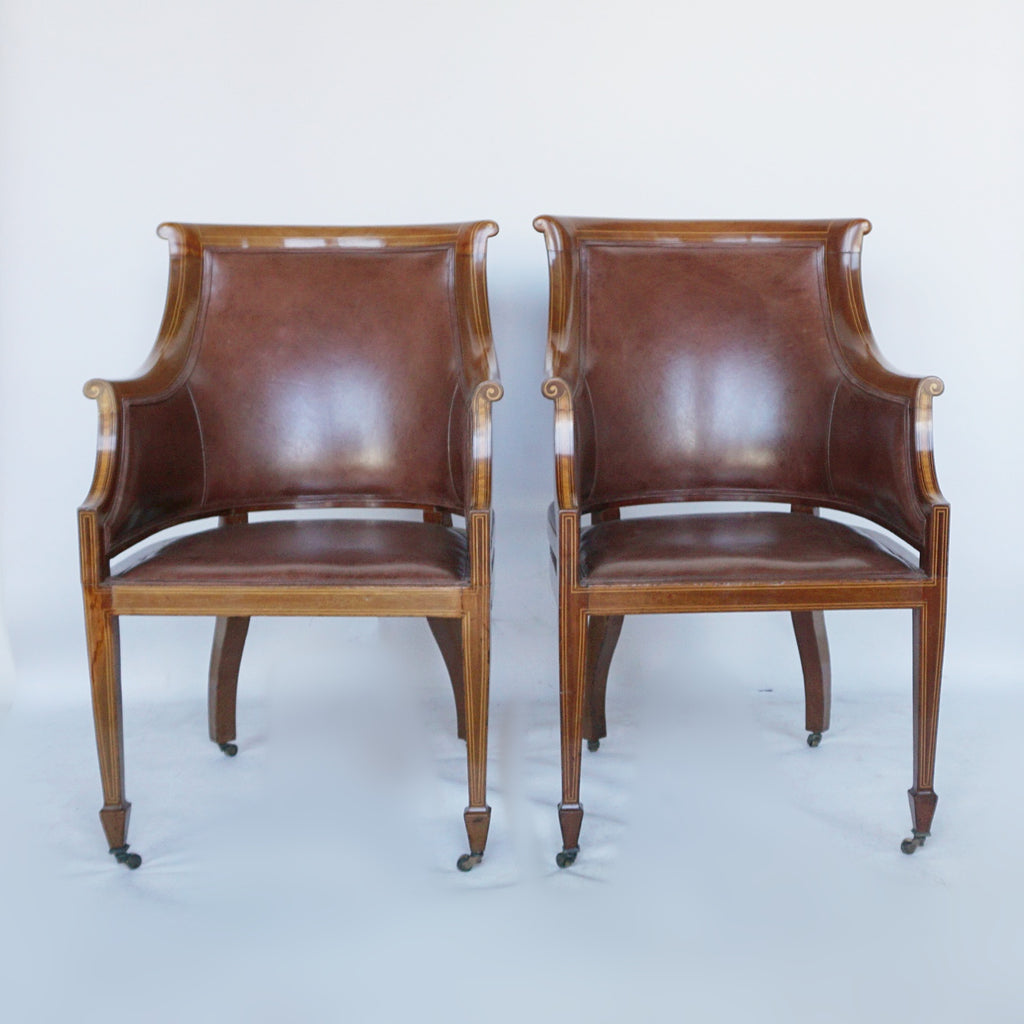 A Pair of Edwardian Armchairs Re-Upholstered in chestnut leather - Jeroen Markies Art Deco