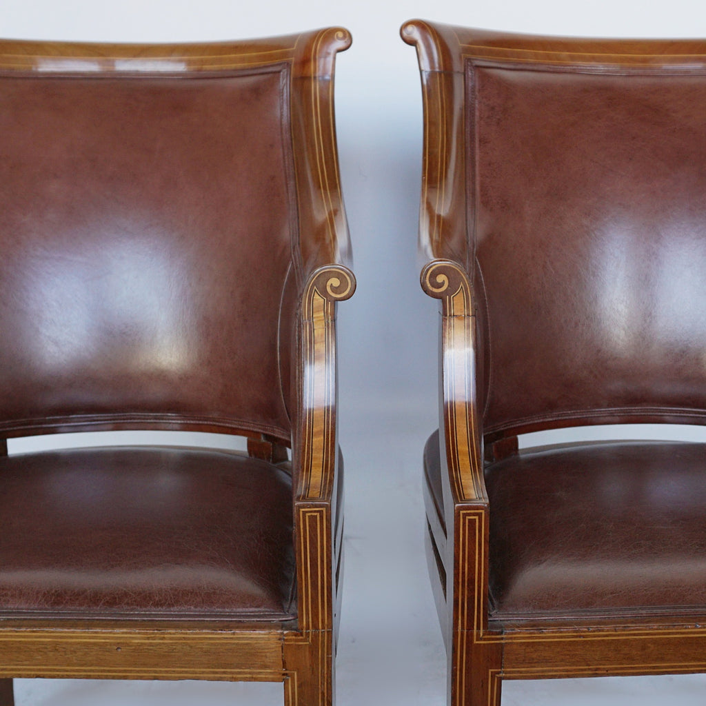 A Pair of Edwardian Armchairs Re-Upholstered in chestnut leather - Jeroen Markies Art Deco