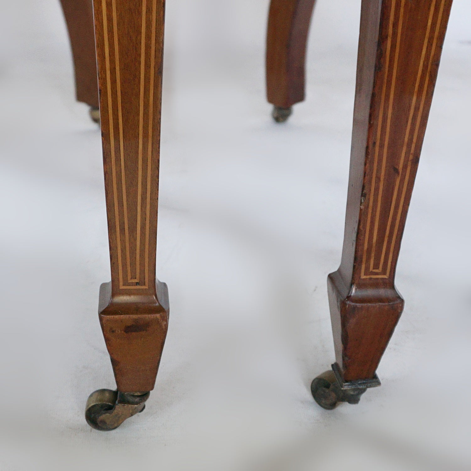 A Pair of Edwardian Armchairs Re-Upholstered in chestnut leather - Jeroen Markies Art Deco