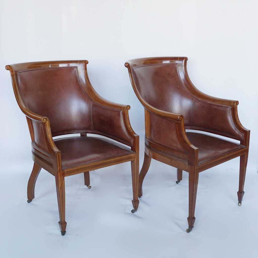 A Pair of Edwardian Armchairs Re-Upholstered in chestnut leather - Jeroen Markies Art Deco