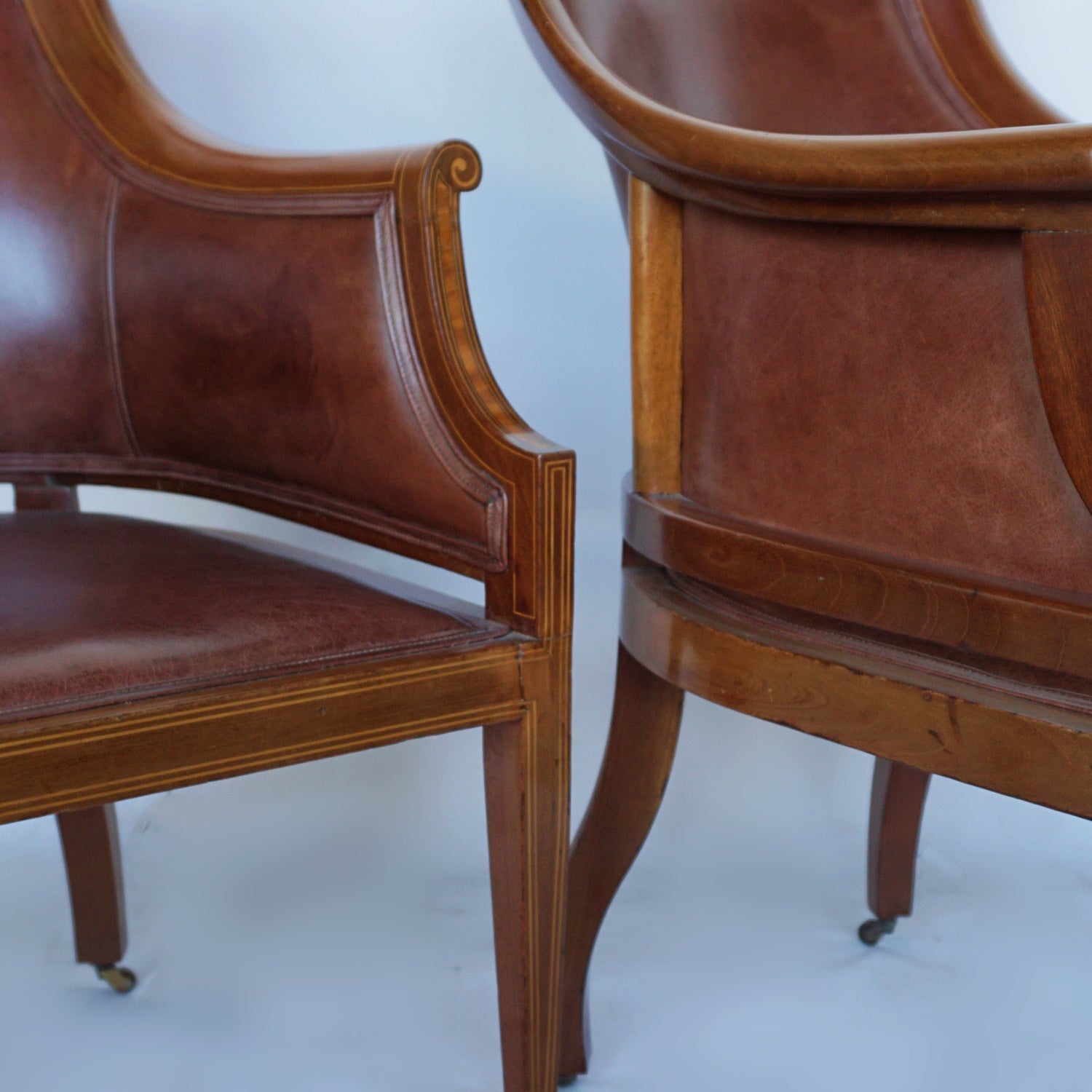 A Pair of Edwardian Armchairs Re-Upholstered in chestnut leather - Jeroen Markies Art Deco
