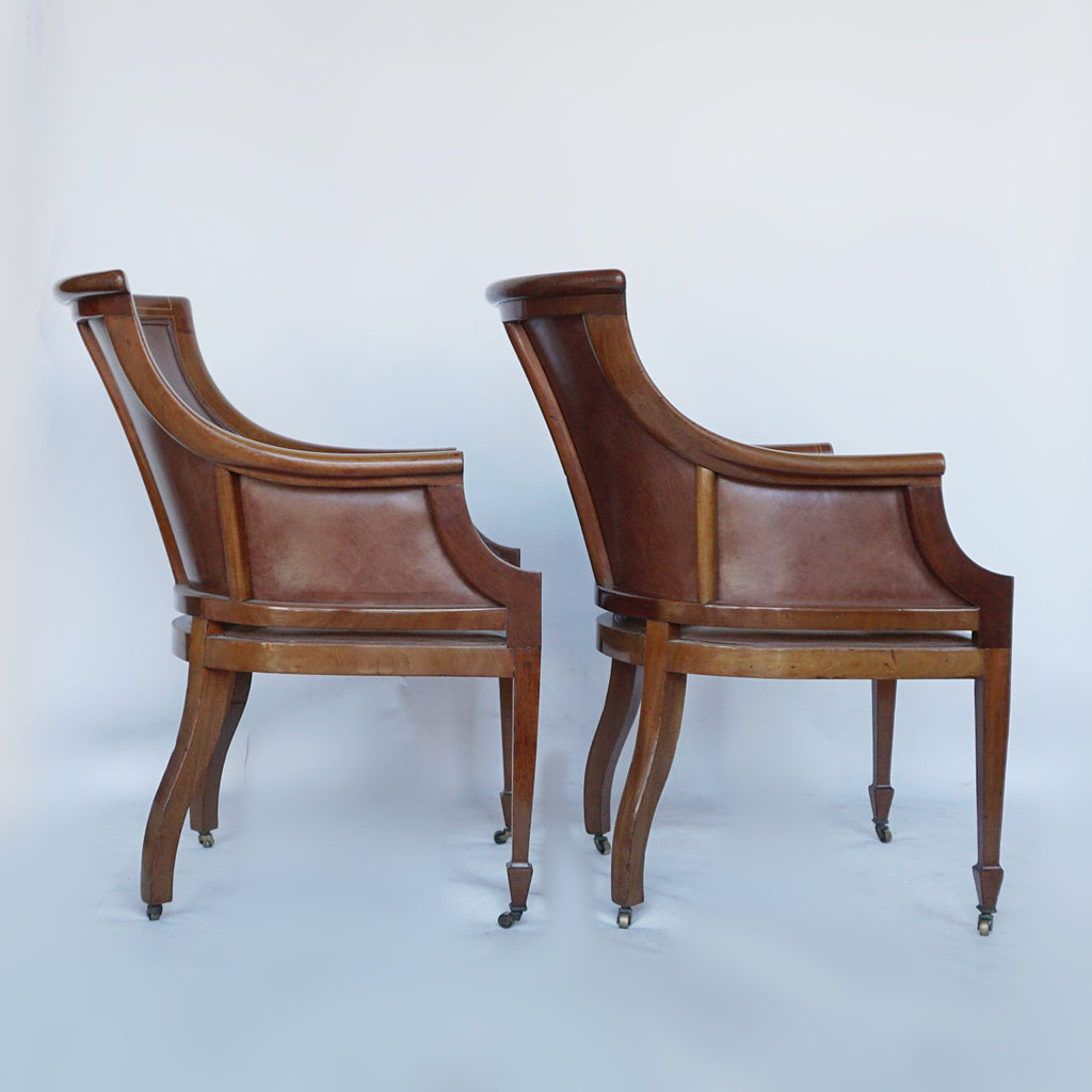 A Pair of Edwardian Armchairs Re-Upholstered in chestnut leather - Jeroen Markies Art Deco