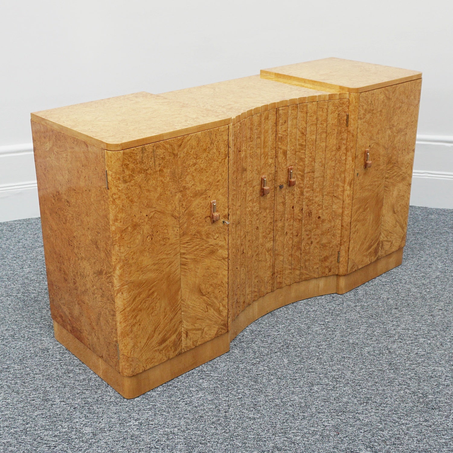 Art Deco Sideboard by Harry & Lou Epstein English Circa 1930 veneered in burr walnut with original bakelite handles. Vintage Art Deco - Jeroen Markies Art Deco