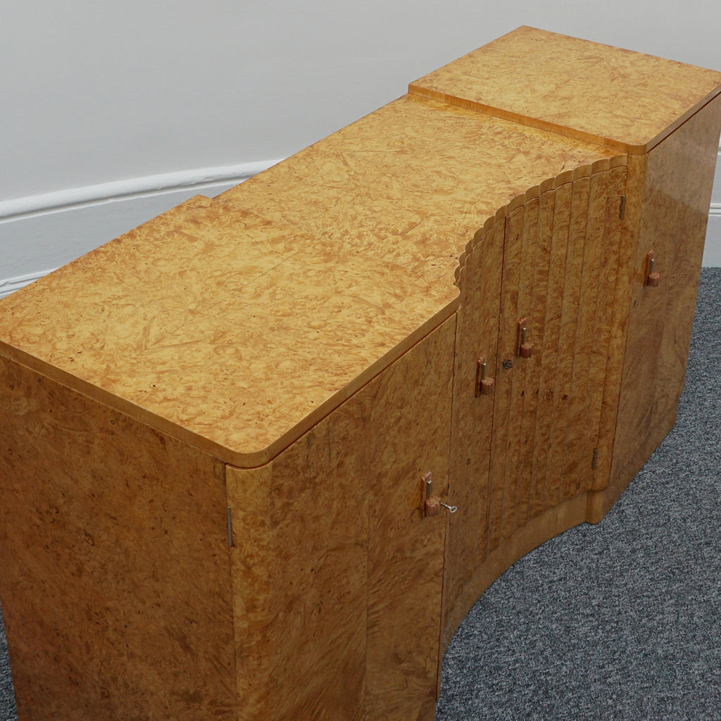 Art Deco Sideboard by Harry & Lou Epstein English Circa 1930 veneered in burr walnut with original bakelite handles. Vintage Art Deco - Jeroen Markies Art Deco