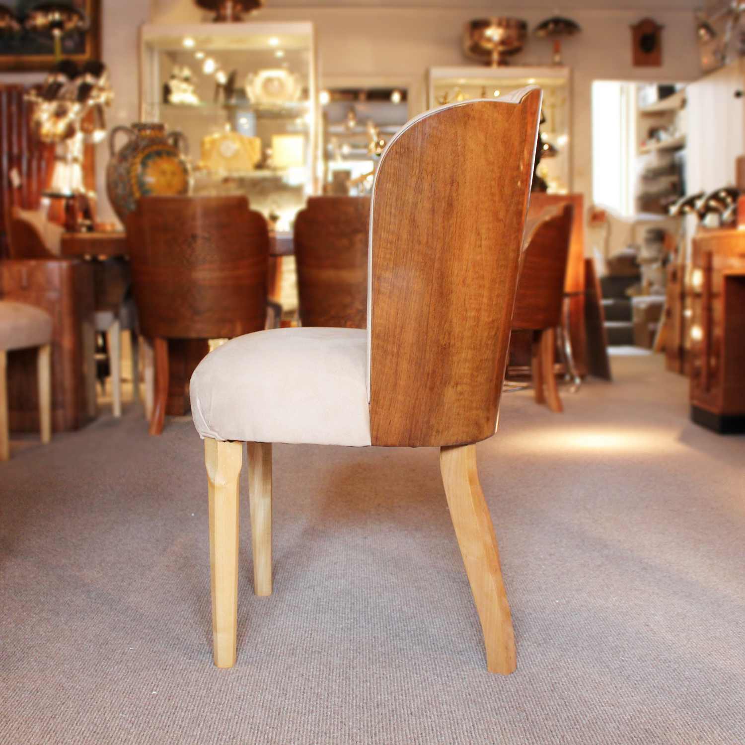 Art Deco 6 seat dining suite by Harry & Lou Epstein in figured walnut at Jeroen Markies