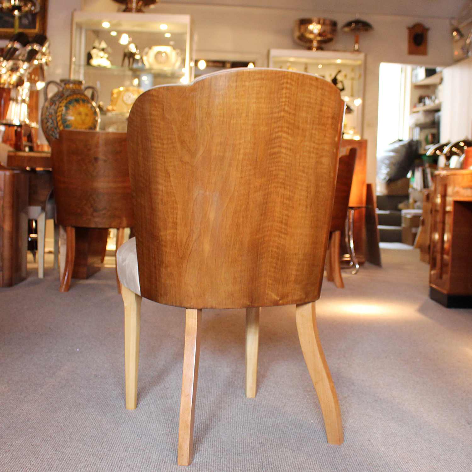 Art Deco 6 seat dining suite by Harry & Lou Epstein in figured walnut at Jeroen Markies