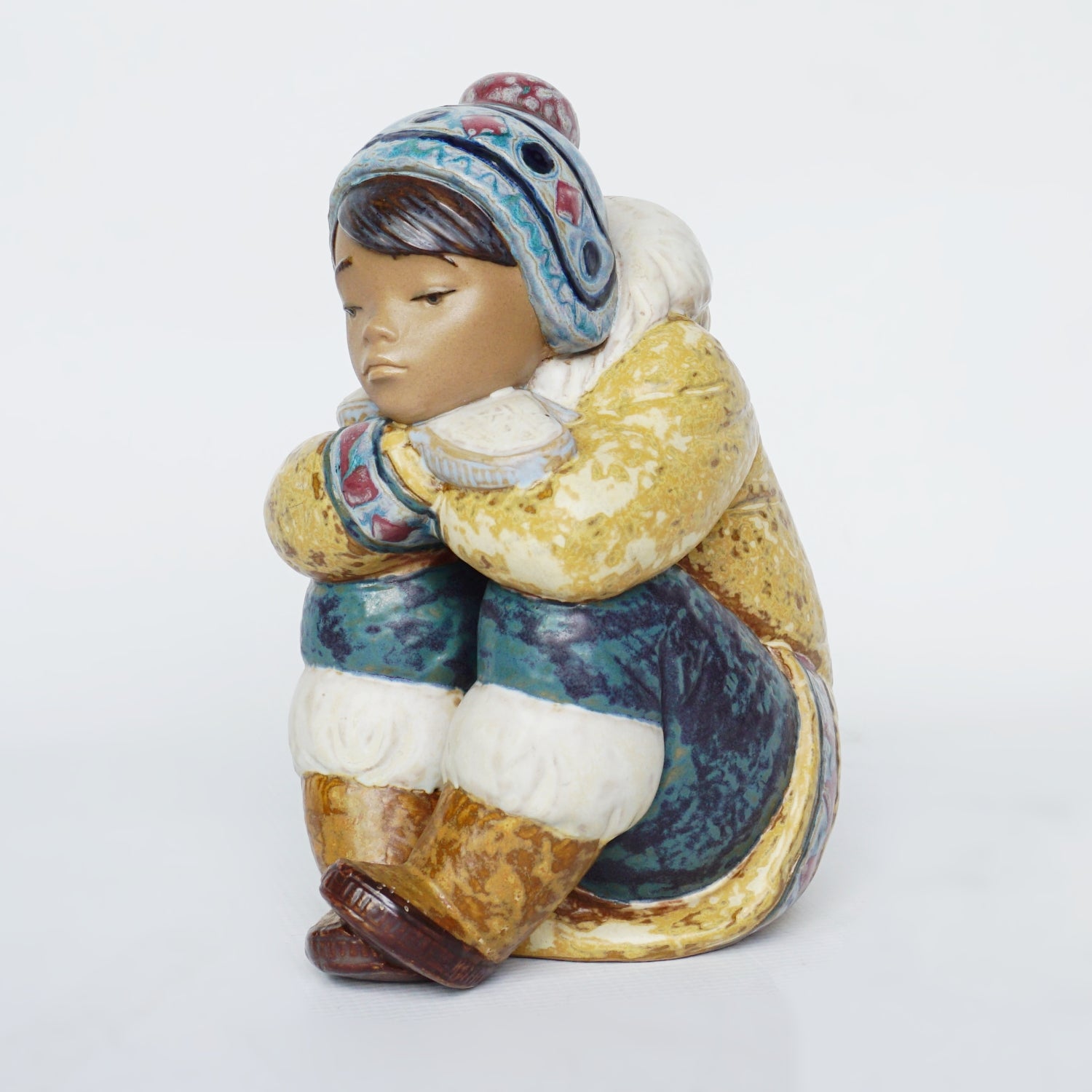 Pensive Eskimo Boy Pottery Figurine by Francisco Catalá for Lladró - Jeroen Markies Art Deco