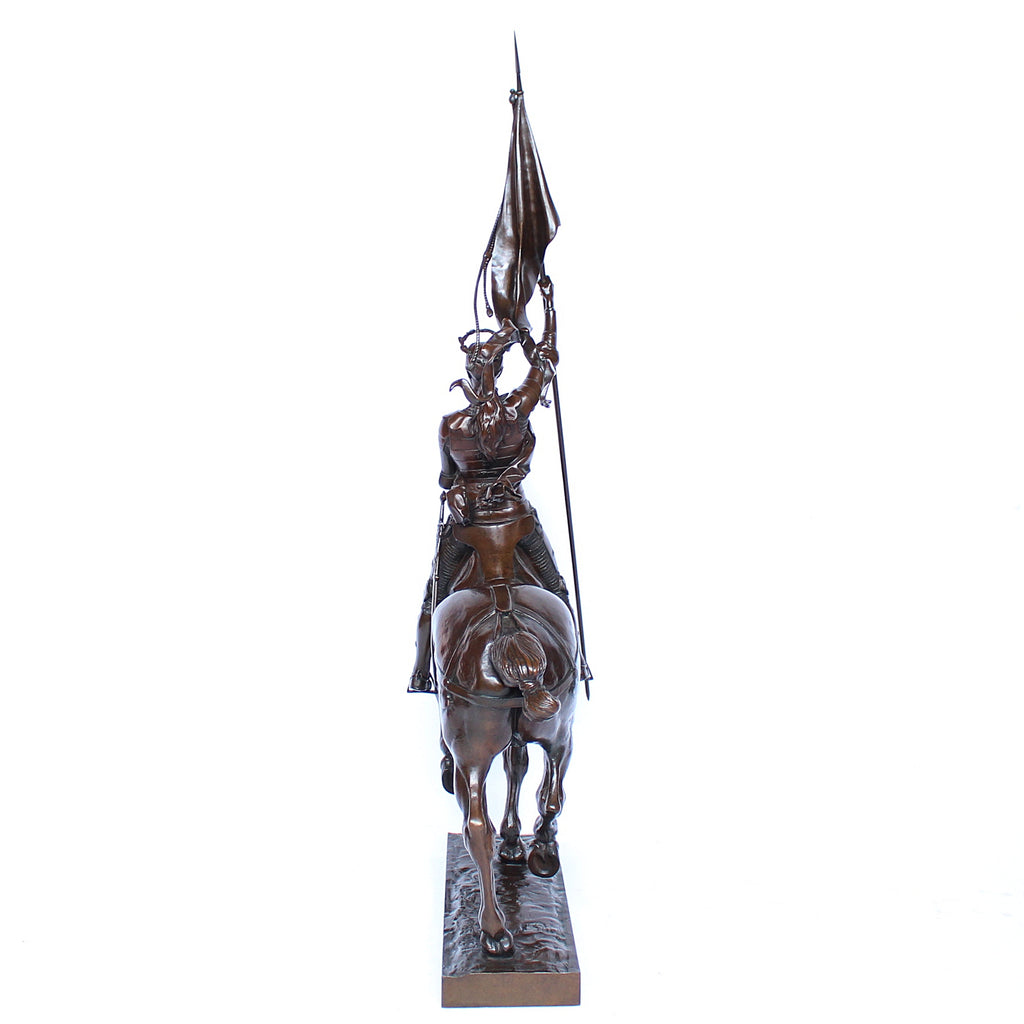 Jeanne d'Arc. A stunning early salon version of the famous Joan of Arc in the Place des Pyramides in Paris. Wonderful rich brown patina and stunning hand chased detail and characterisation. Set on an integral, naturalistic plinth. Signed E Fremiet to cast at Jeroen Markies