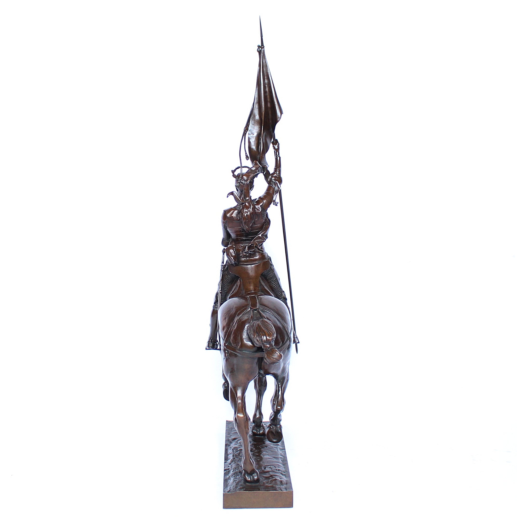 Jeanne d'Arc. A stunning early salon version of the famous Joan of Arc in the Place des Pyramides in Paris. Wonderful rich brown patina and stunning hand chased detail and characterisation. Set on an integral, naturalistic plinth. Signed E Fremiet to cast at Jeroen Markies
