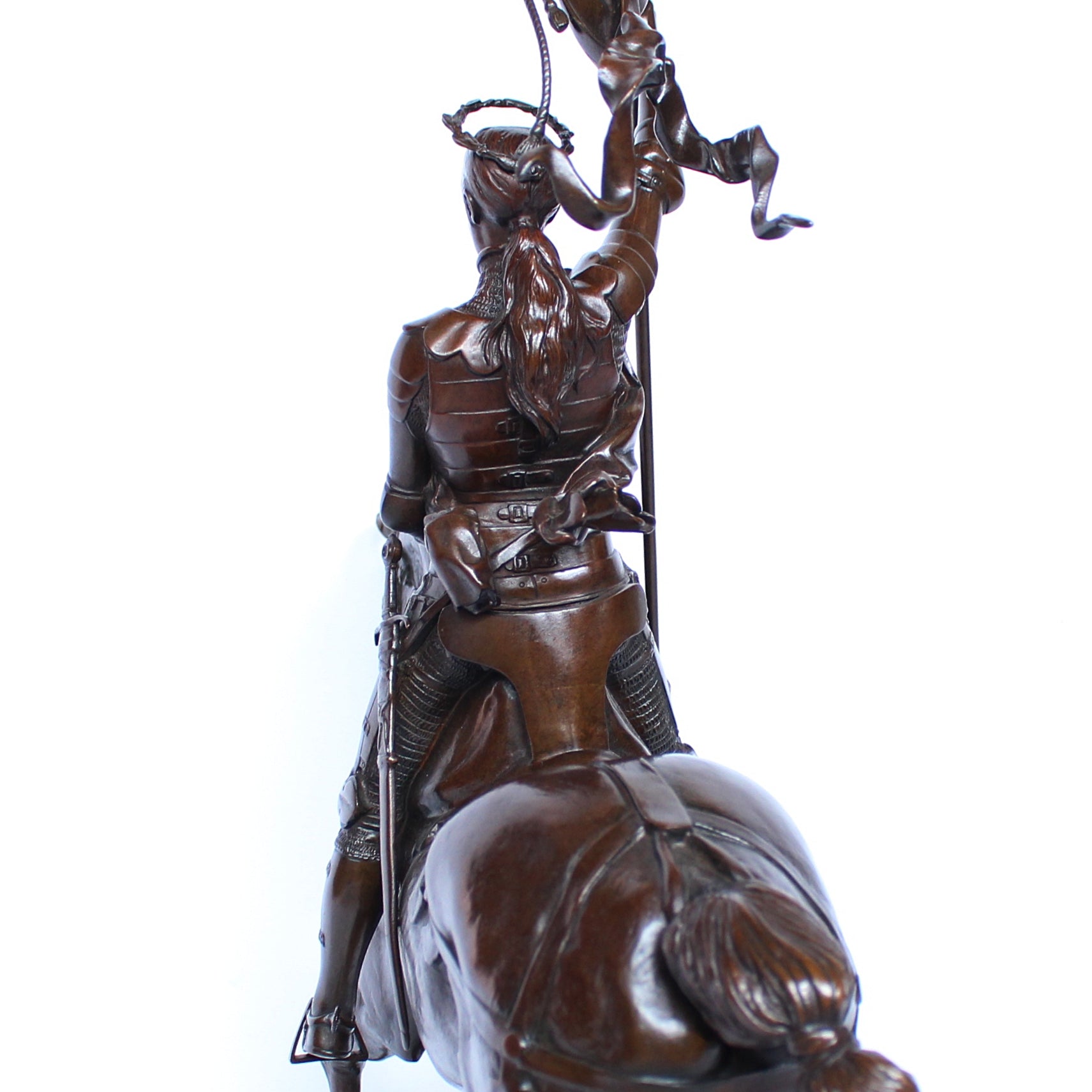 Jeanne d'Arc. A stunning early salon version of the famous Joan of Arc in the Place des Pyramides in Paris. Wonderful rich brown patina and stunning hand chased detail and characterisation. Set on an integral, naturalistic plinth. Signed E Fremiet to cast at Jeroen Markies