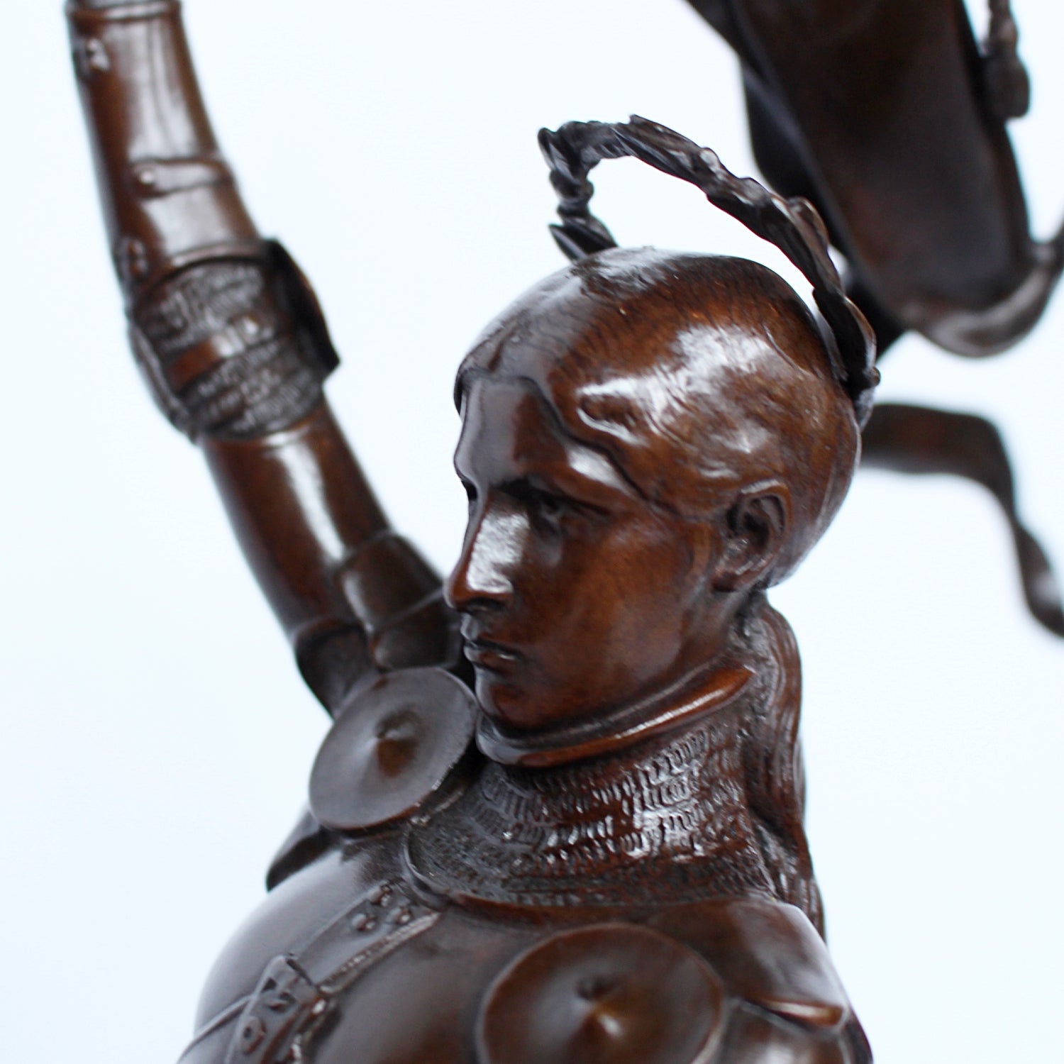 Jeanne d'Arc. A stunning early salon version of the famous Joan of Arc in the Place des Pyramides in Paris. Wonderful rich brown patina and stunning hand chased detail and characterisation. Set on an integral, naturalistic plinth. Signed E Fremiet to cast at Jeroen Markies