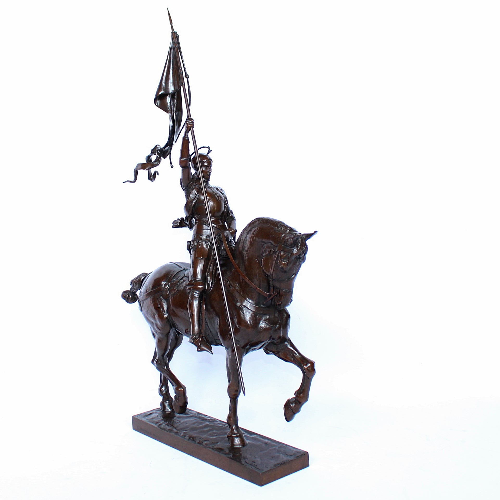 Jeanne d'Arc. A stunning early salon version of the famous Joan of Arc in the Place des Pyramides in Paris. Wonderful rich brown patina and stunning hand chased detail and characterisation. Set on an integral, naturalistic plinth. Signed E Fremiet to cast at Jeroen Markies