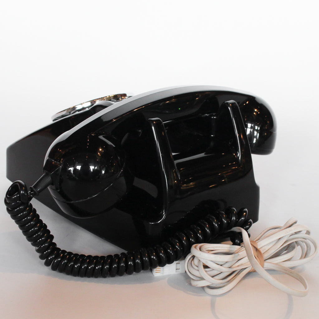 An original GPO model 706 telephone in black at Jeroen Markies