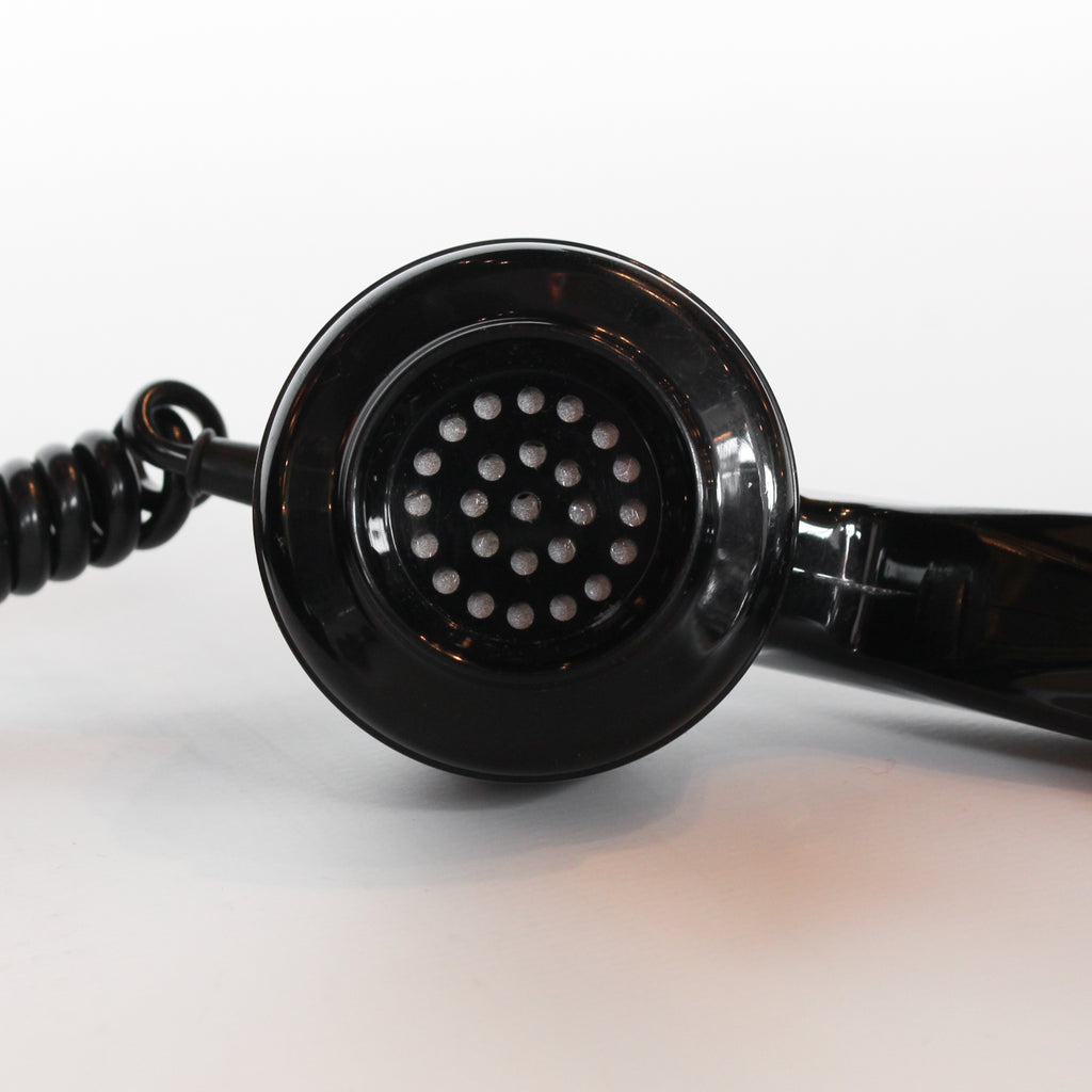 An original GPO model 706 telephone in black at Jeroen Markies