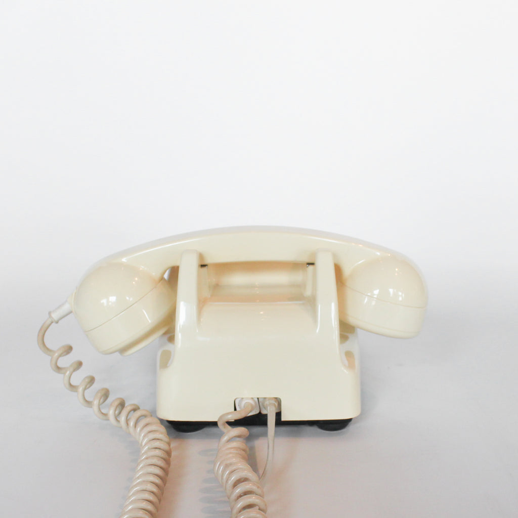 An original GPO model 706 telephone in cream at Jeroen Markies
