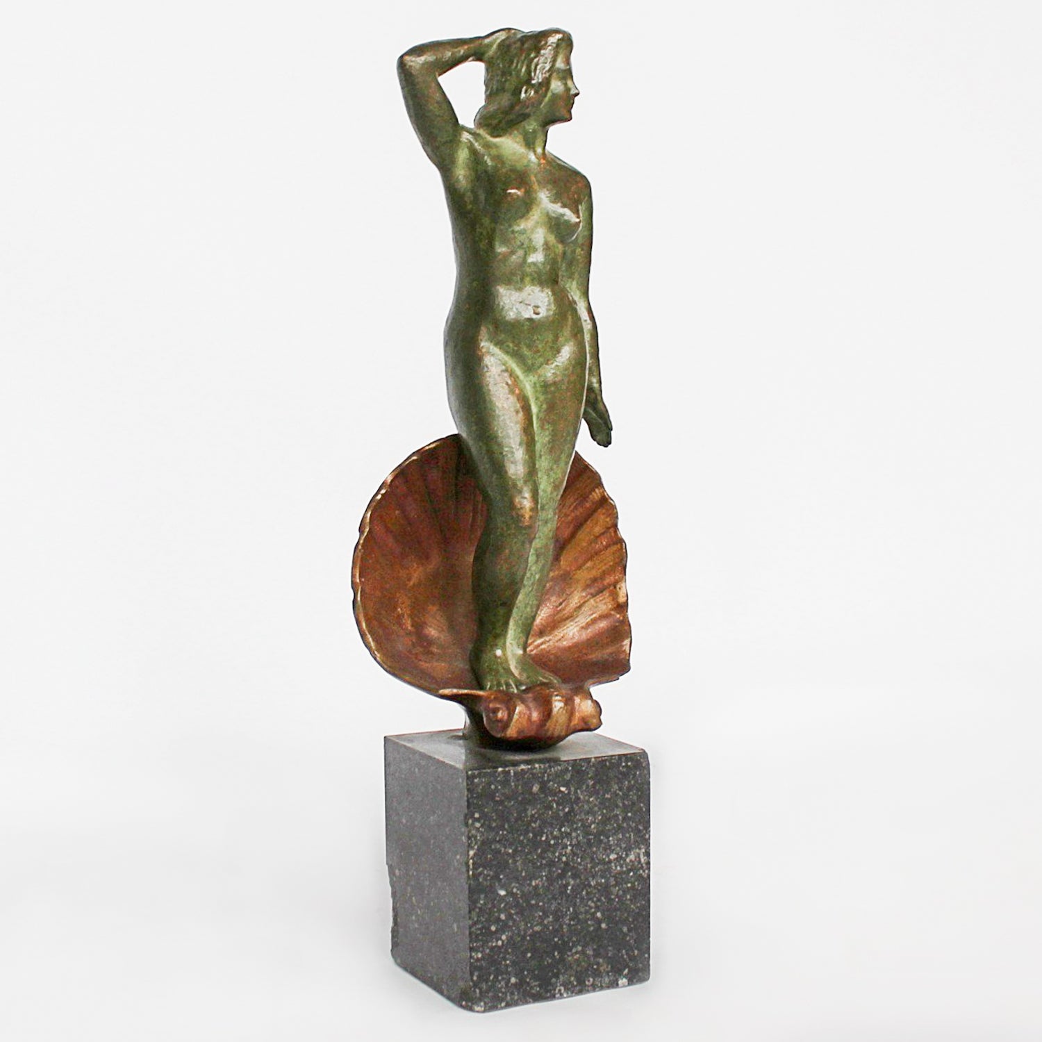 Venus, an Art Deco verdigris patinated and cold painted bronze sculpture. Depicts the figure of Venus emerging, set over a marble plinth. Chips to marble at Jeroen Markies