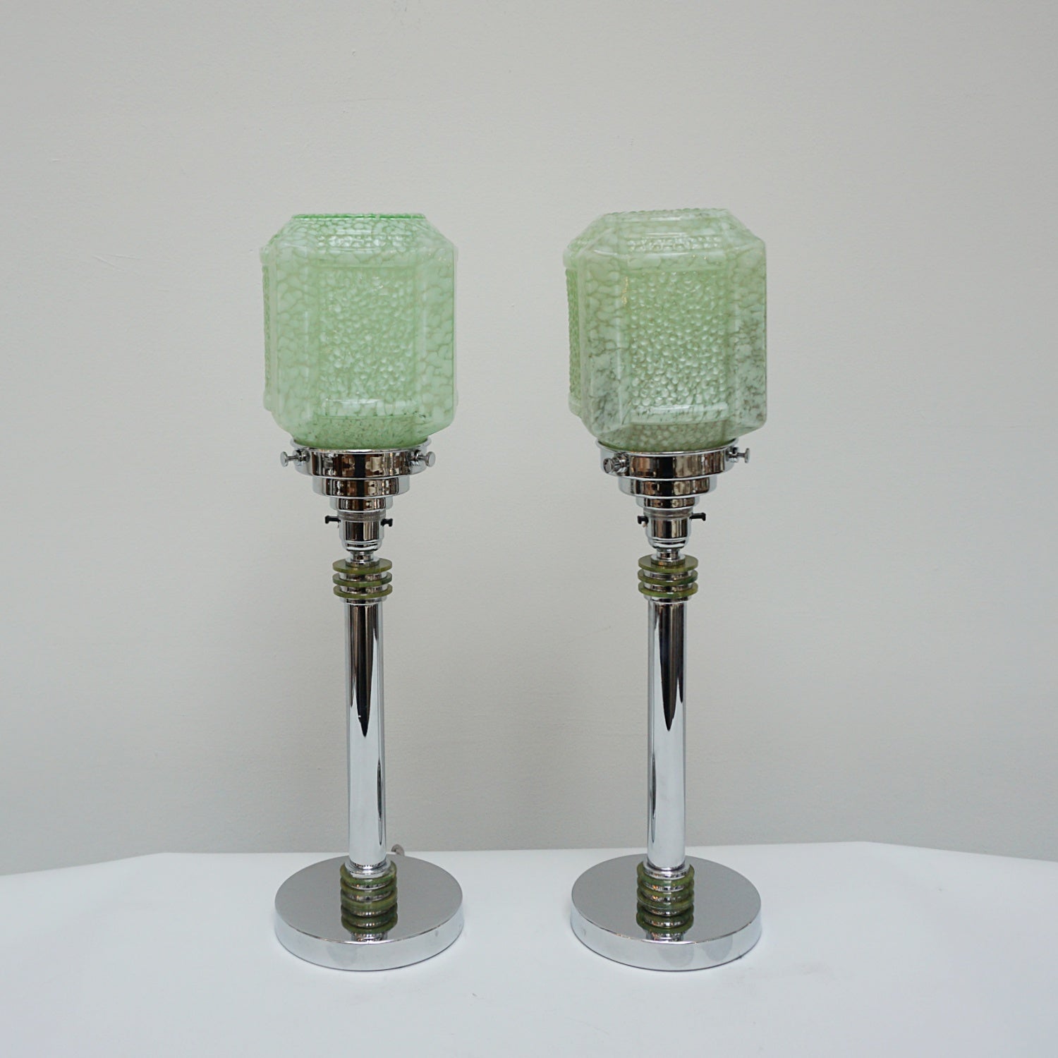 A Pair of Table Lamps - Green glass cubic shade - chromed metal stem with mottled green bakelite - Jeroen Markies Art Deco