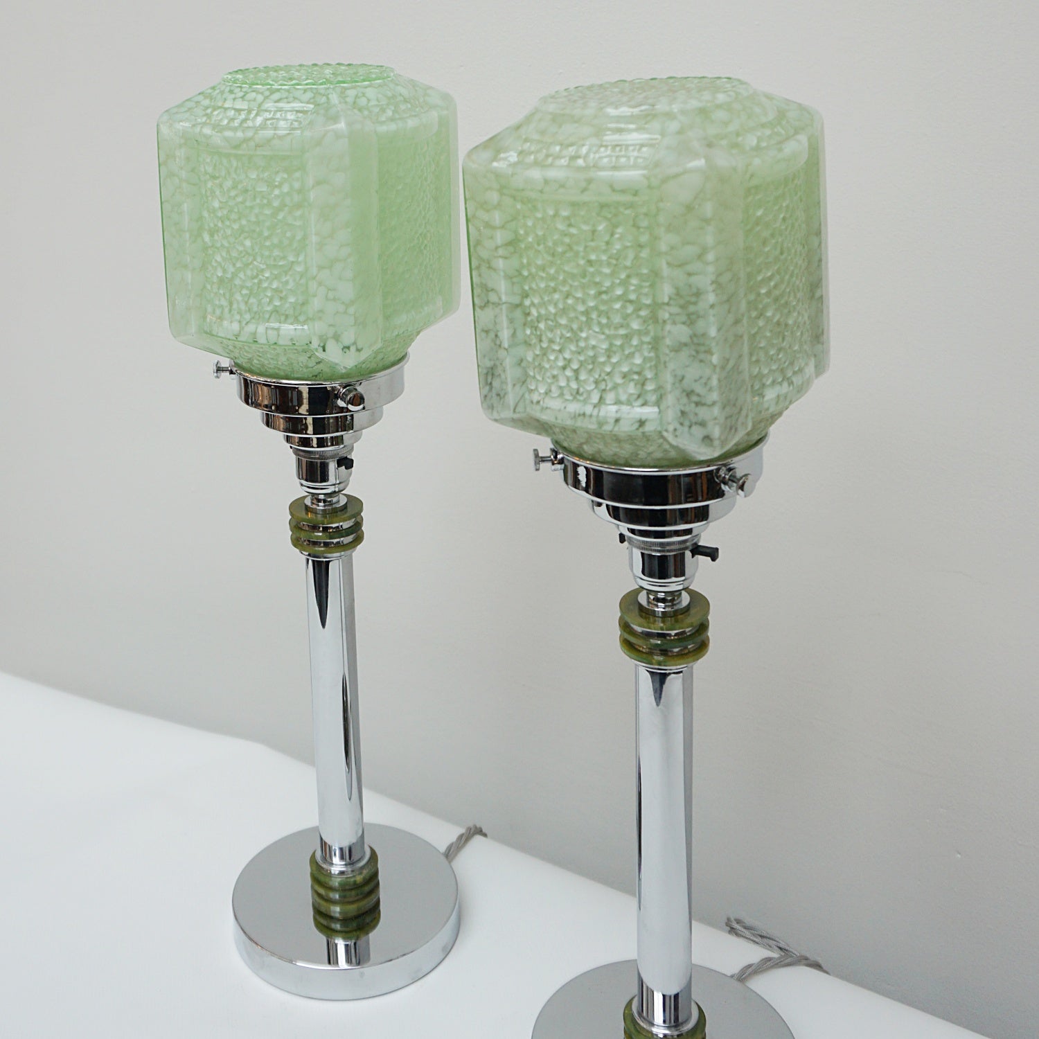A Pair of Table Lamps - Green glass cubic shade - chromed metal stem with mottled green bakelite - Jeroen Markies Art Deco