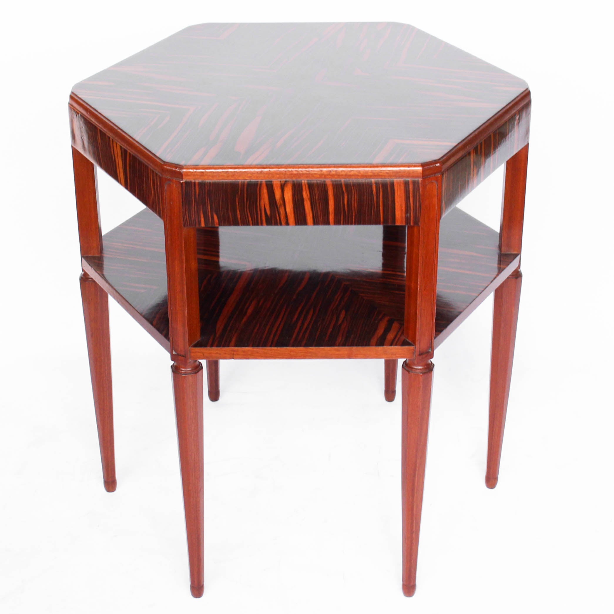 A solid, mahogany hexagonal side/centre table with macassar ebony veneer, quarter veneer to top, second tier and solid mahogany legs at Jeroen Markies