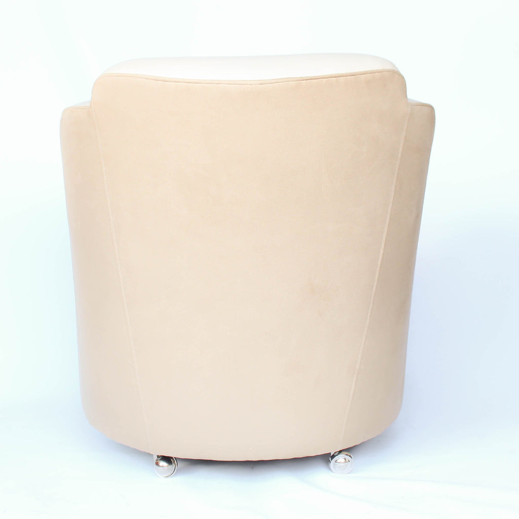 A pair of Art Deco, cloud back armchairs, re-leathered in cream leather at Jeroen Markies.