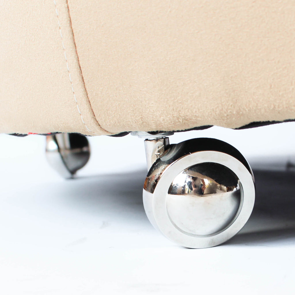 A pair of Art Deco, cloud back armchairs, re-leathered in cream leather at Jeroen Markies.