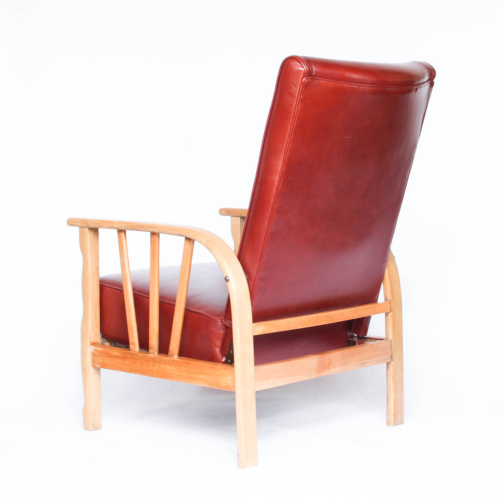 An Art Deco pair of leather reclining lounge chairs with oak, ash and beech frames. Reupholstered in old English chestnut leather at Jeroen Markies.