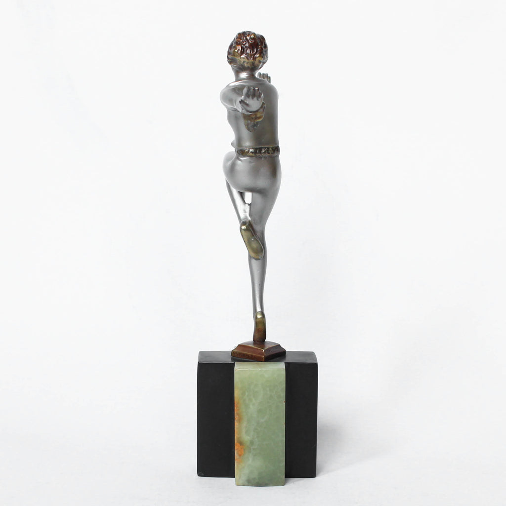 An Art Deco, cold painted bronze figure by Josef Lorenzl (1892-1950). A dancing woman in stylised pose set over a green onyx plinth at Jeroen Markies