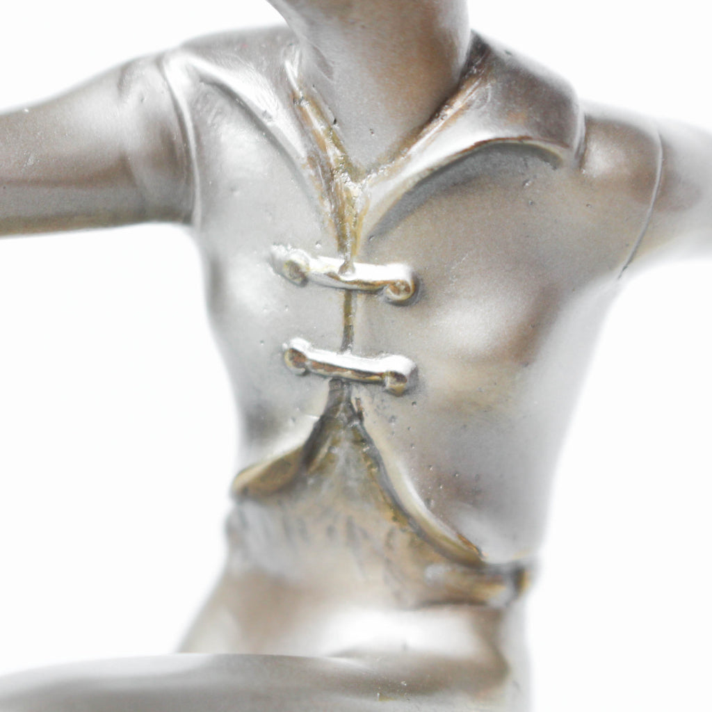 An Art Deco, cold painted bronze figure by Josef Lorenzl (1892-1950). A dancing woman in stylised pose set over a green onyx plinth at Jeroen Markies