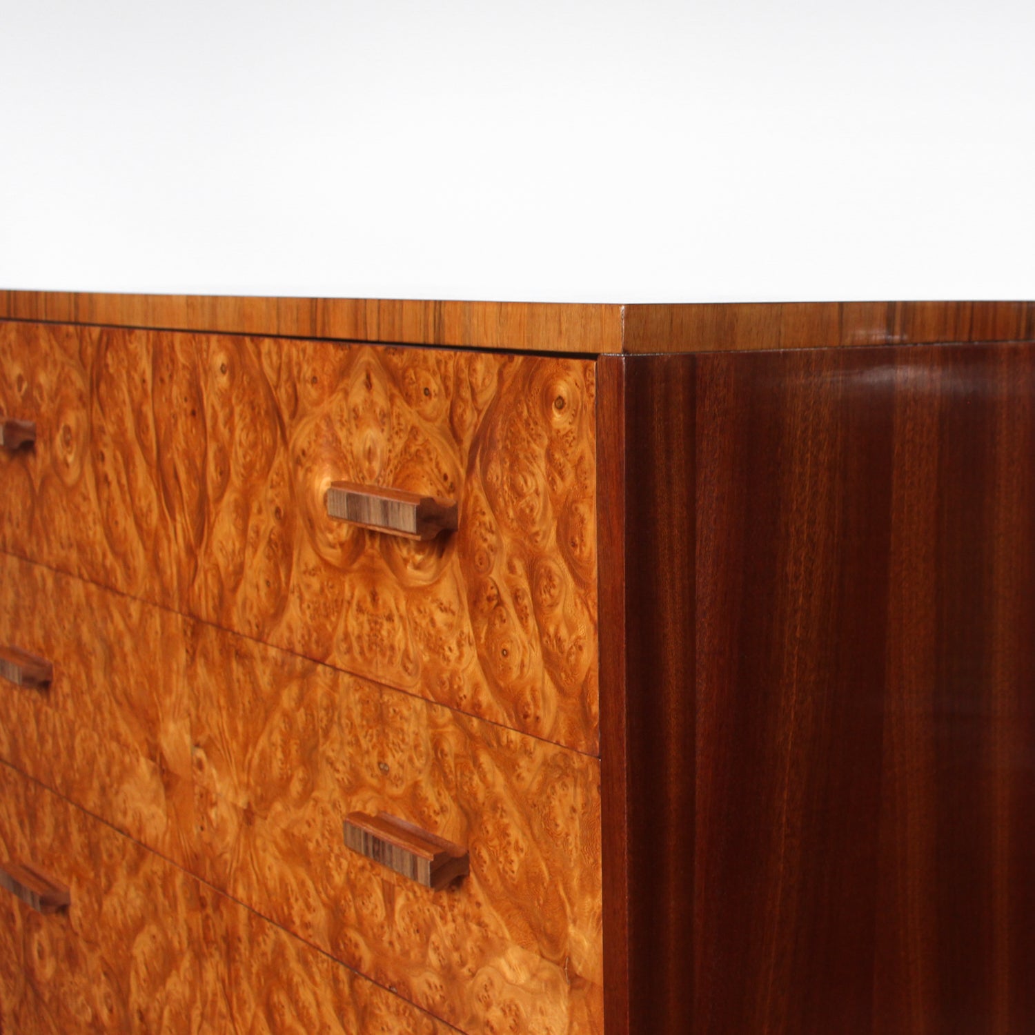 Art Deco, burr walnut chest of drawers. Original wooden handles. H.G Furniture sticker at Jeroen Markies.