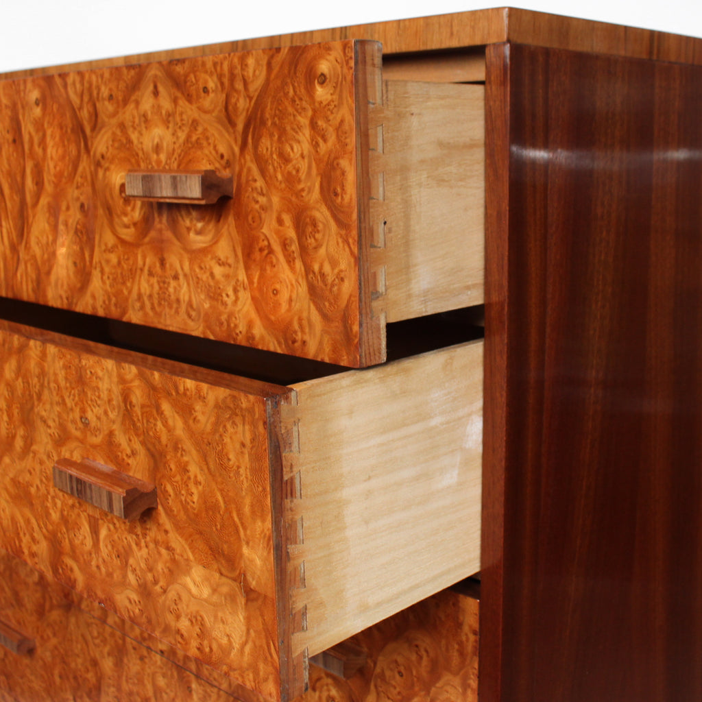 Art Deco, burr walnut chest of drawers. Original wooden handles. H.G Furniture sticker at Jeroen Markies.