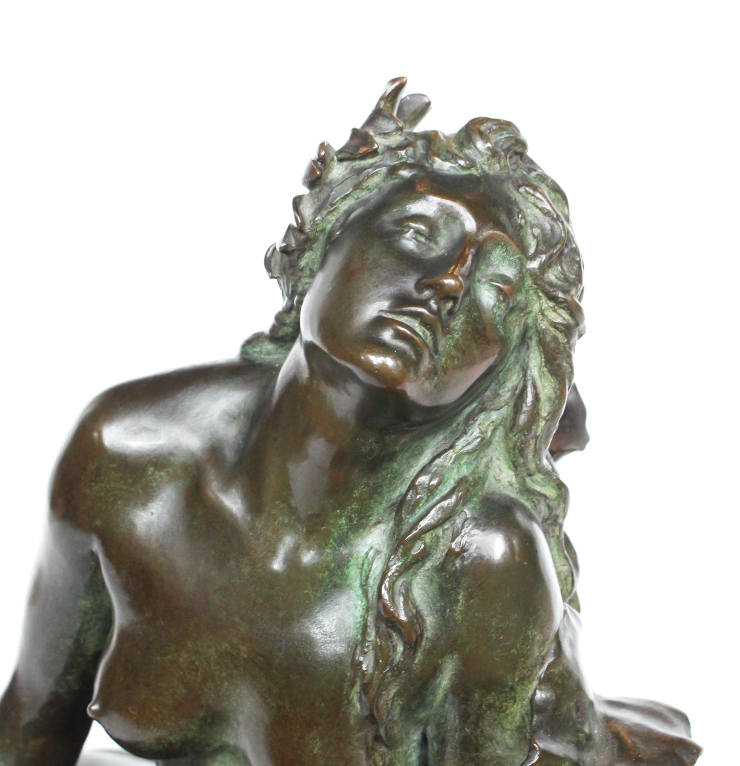 Clytie, a verdigris patinated bronze sculpture by François Louis Virieux (19th and 20thC). Depicts Clytie, the nymph infatuated with Helios, god of the sun. She eventually became a sunflower because, like the flower, she followed her unrequited love with her gaze wherever he went at Jeroen Markies.