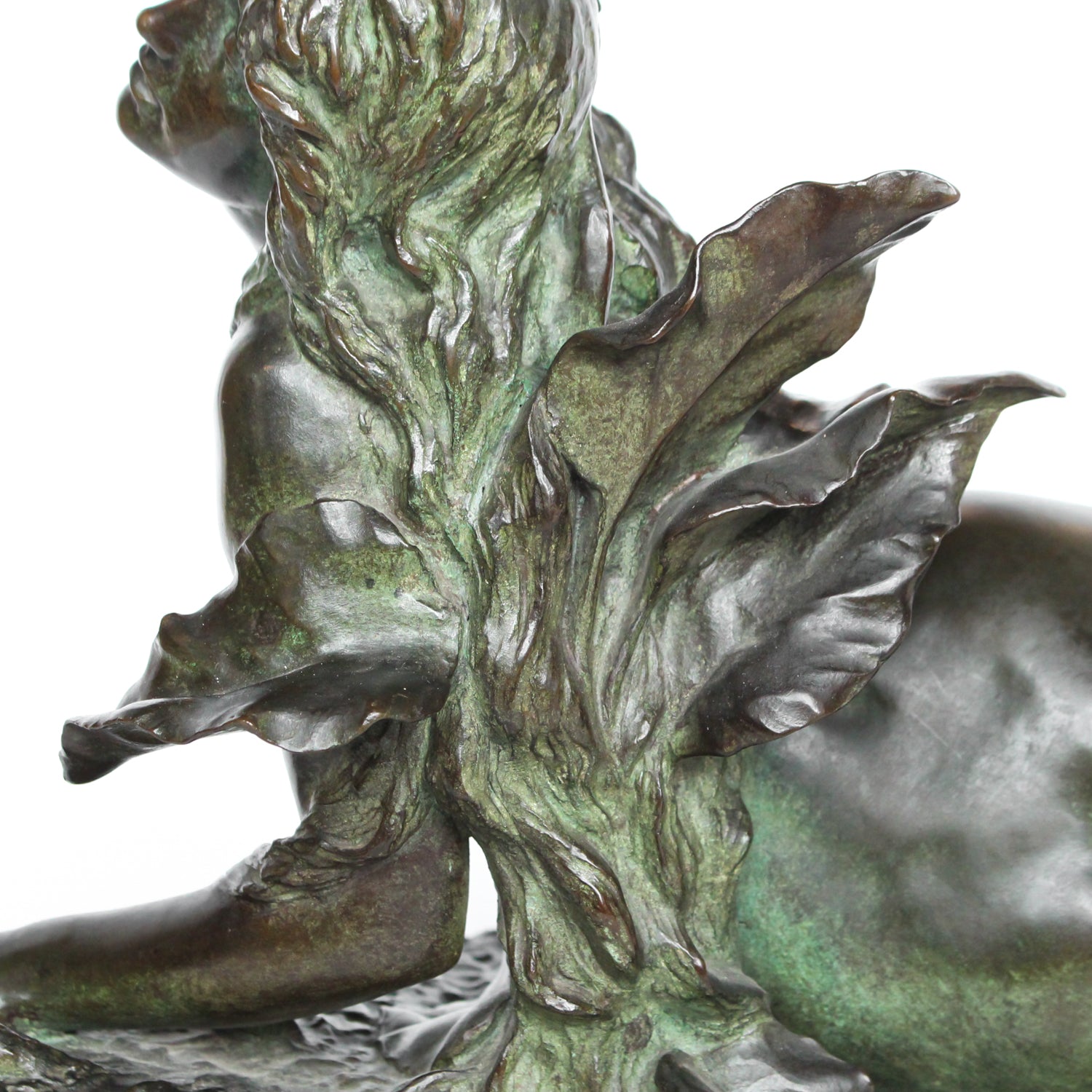 Clytie, a verdigris patinated bronze sculpture by François Louis Virieux (19th and 20thC). Depicts Clytie, the nymph infatuated with Helios, god of the sun. She eventually became a sunflower because, like the flower, she followed her unrequited love with her gaze wherever he went at Jeroen Markies.