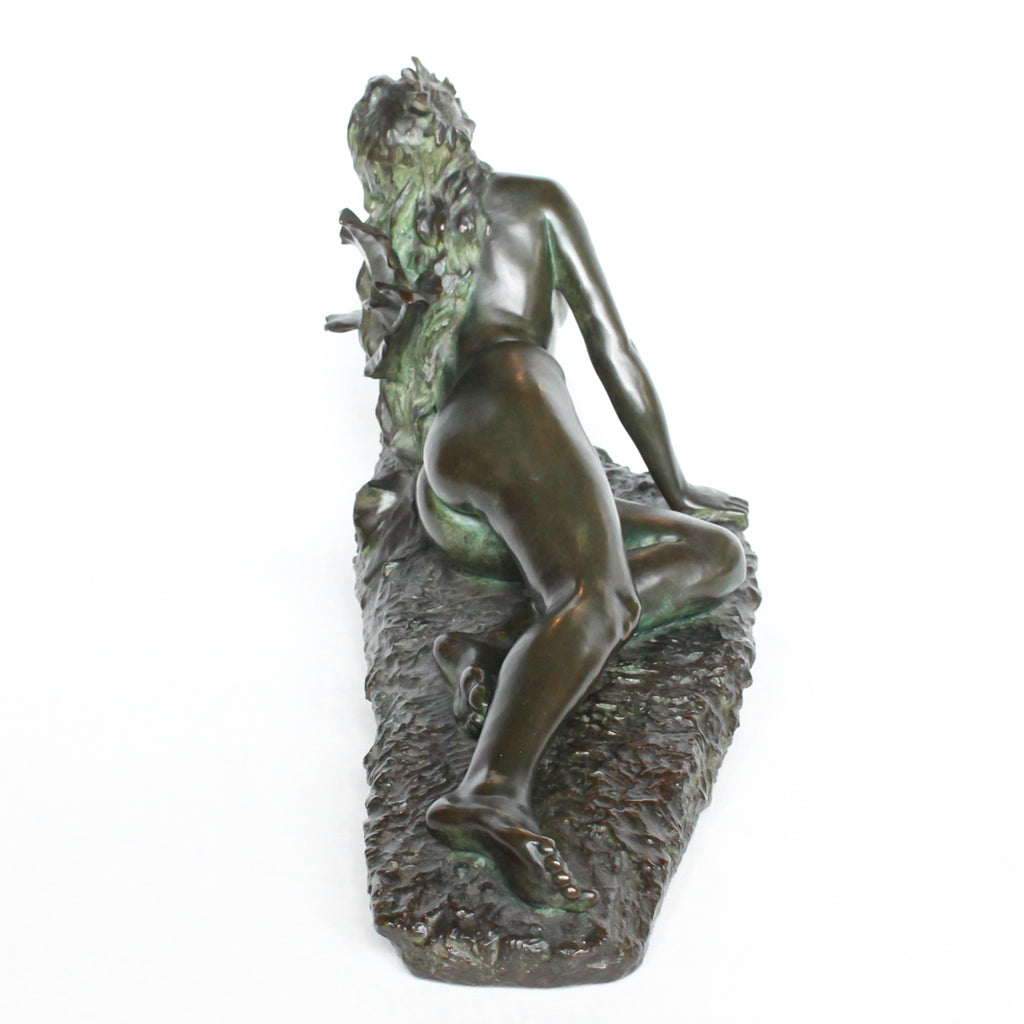 Clytie, a verdigris patinated bronze sculpture by François Louis Virieux (19th and 20thC). Depicts Clytie, the nymph infatuated with Helios, god of the sun. She eventually became a sunflower because, like the flower, she followed her unrequited love with her gaze wherever he went at Jeroen Markies.