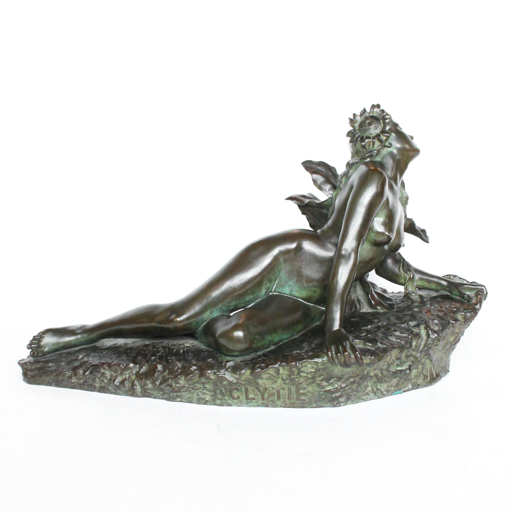 Clytie, a verdigris patinated bronze sculpture by François Louis Virieux (19th and 20thC). Depicts Clytie, the nymph infatuated with Helios, god of the sun. She eventually became a sunflower because, like the flower, she followed her unrequited love with her gaze wherever he went at Jeroen Markies.