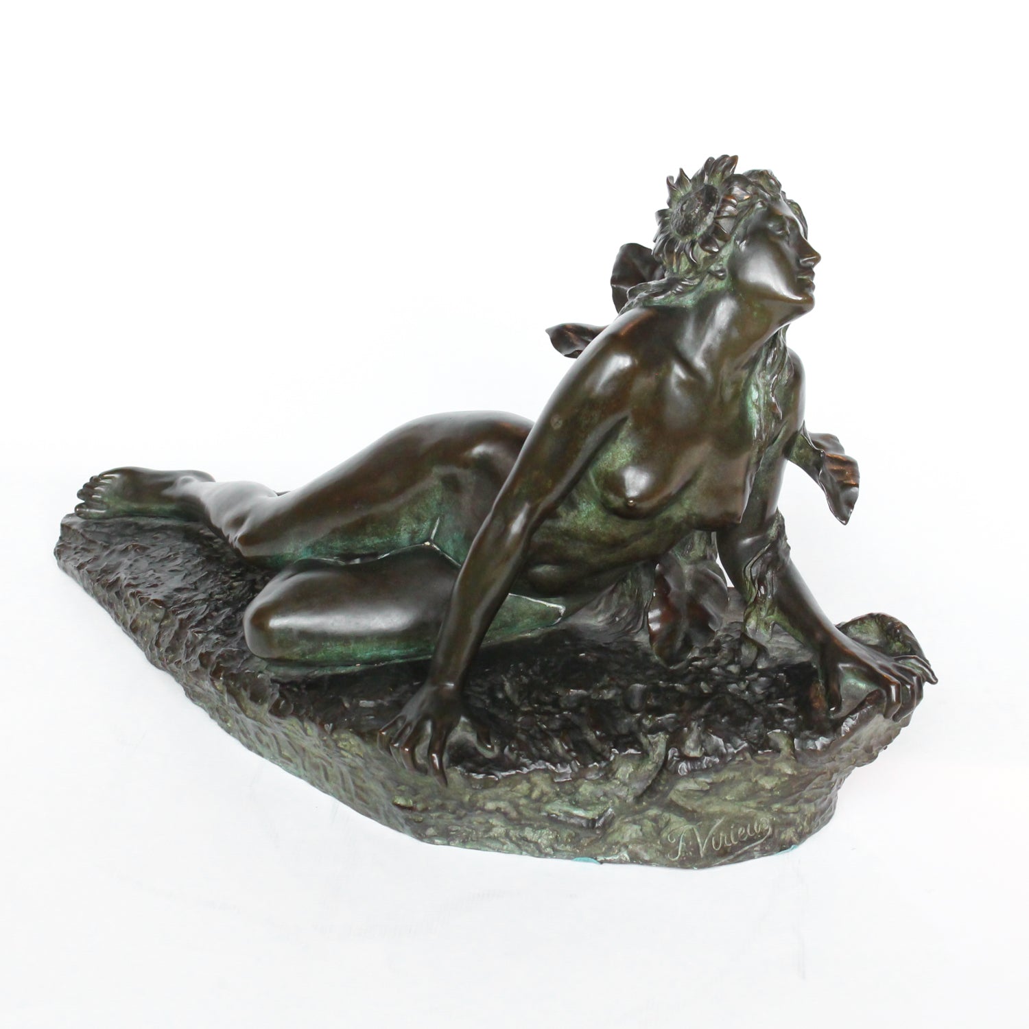 Clytie, a verdigris patinated bronze sculpture by François Louis Virieux (19th and 20thC). Depicts Clytie, the nymph infatuated with Helios, god of the sun. She eventually became a sunflower because, like the flower, she followed her unrequited love with her gaze wherever he went at Jeroen Markies.