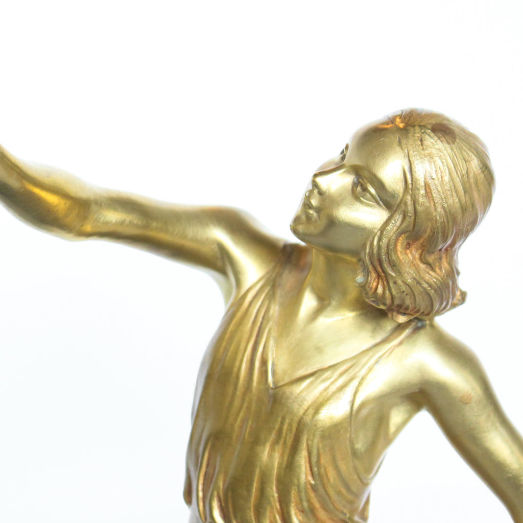 ‘Springtime’, an Art Deco gilt bronze sculpture of a pair of dancers in Grecian dress, set over a marble plinth with gilt bronze detail at Jeroen Markies