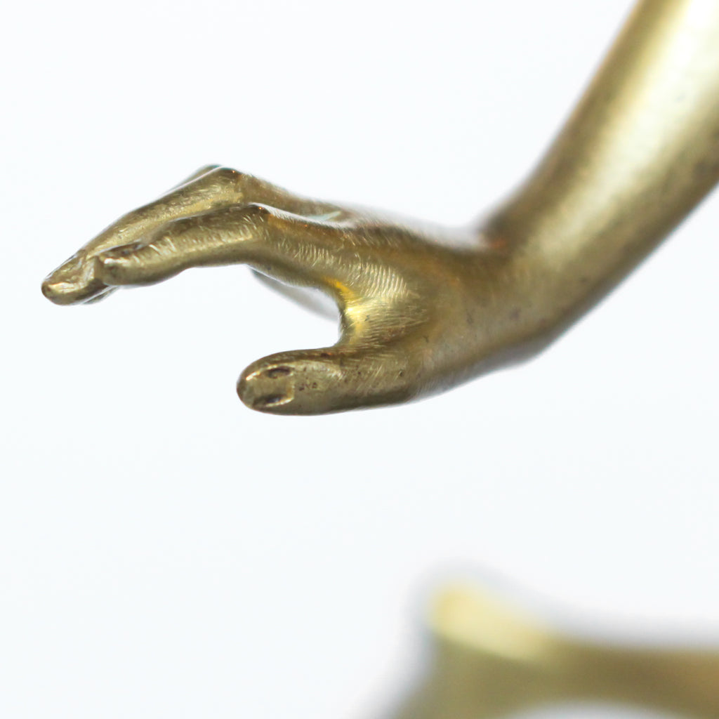 ‘Springtime’, an Art Deco gilt bronze sculpture of a pair of dancers in Grecian dress, set over a marble plinth with gilt bronze detail at Jeroen Markies