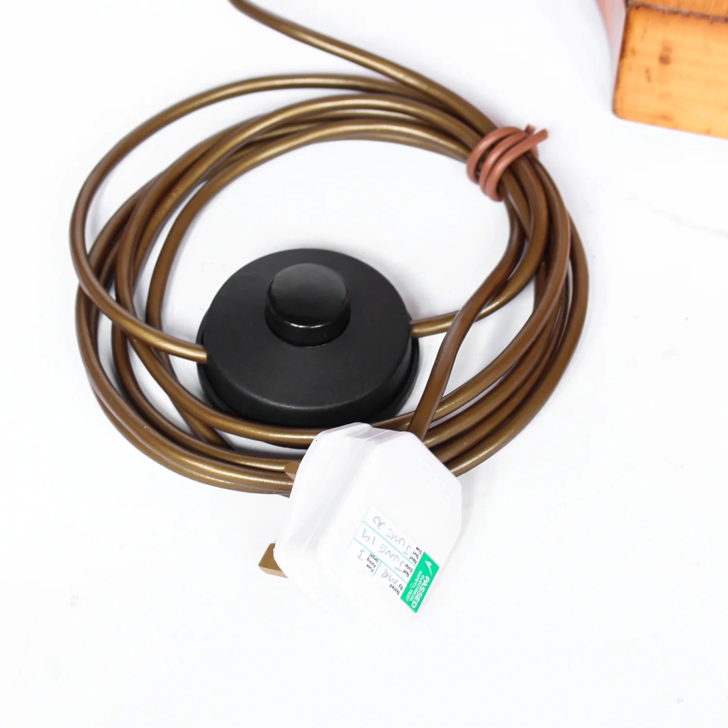 A pair of Art Deco uplighter floor lamps by Harry & Lou Epstein. Made of walnut and satin wood with domed copper shades.