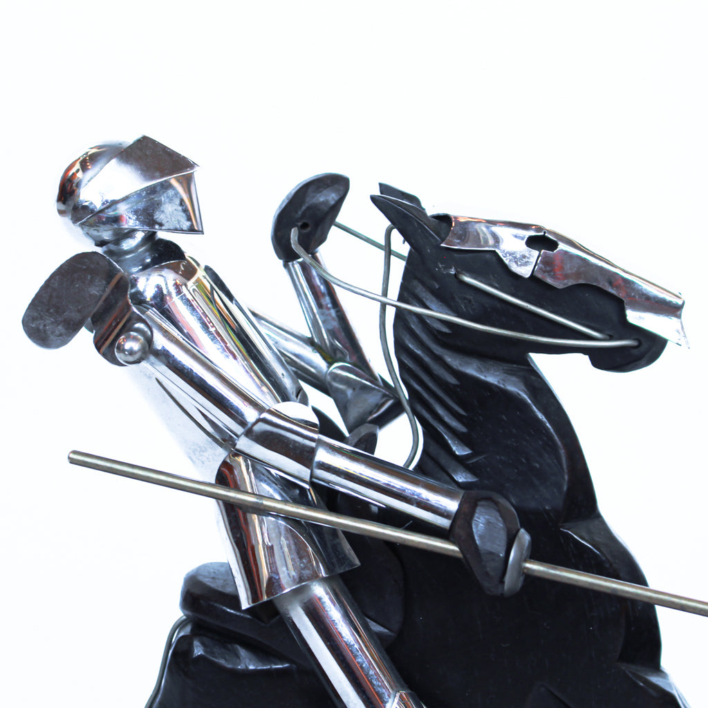 Don Quixote Bookends. Walnut and silver-plated metal in the style of Hagenauer