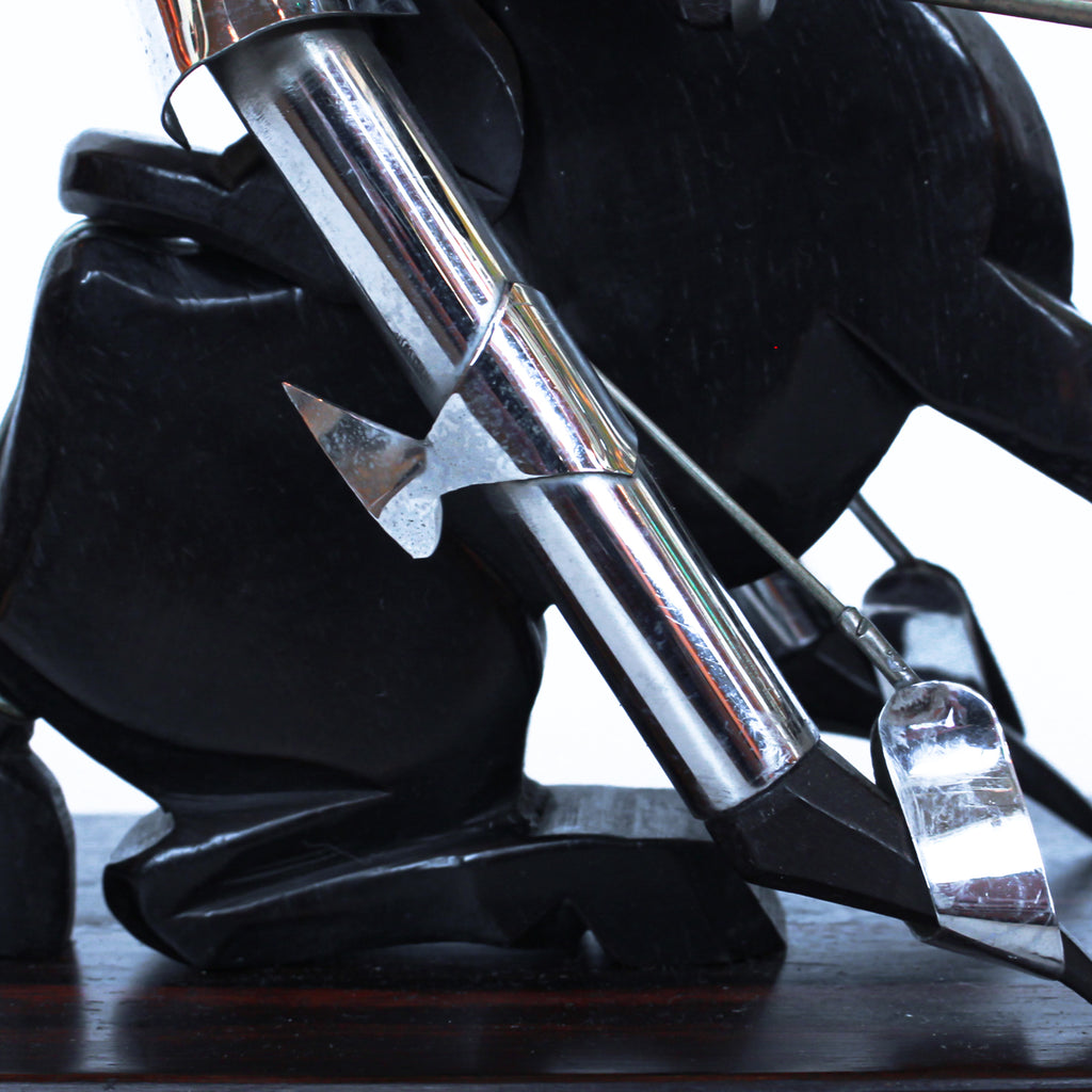 Don Quixote Bookends. Walnut and silver-plated metal in the style of Hagenauer