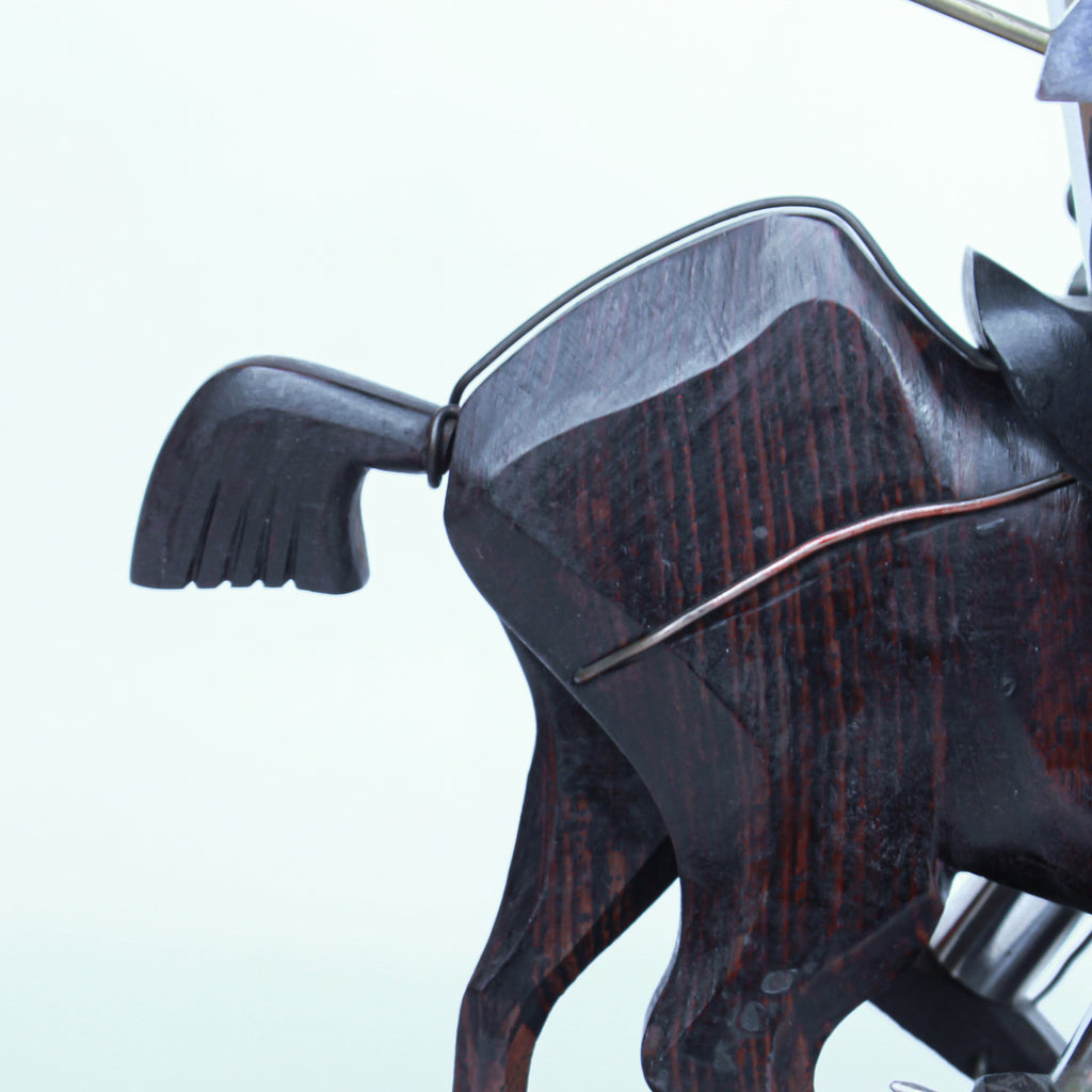 Don Quixote Bookends. Walnut and silver-plated metal in the style of Hagenauer