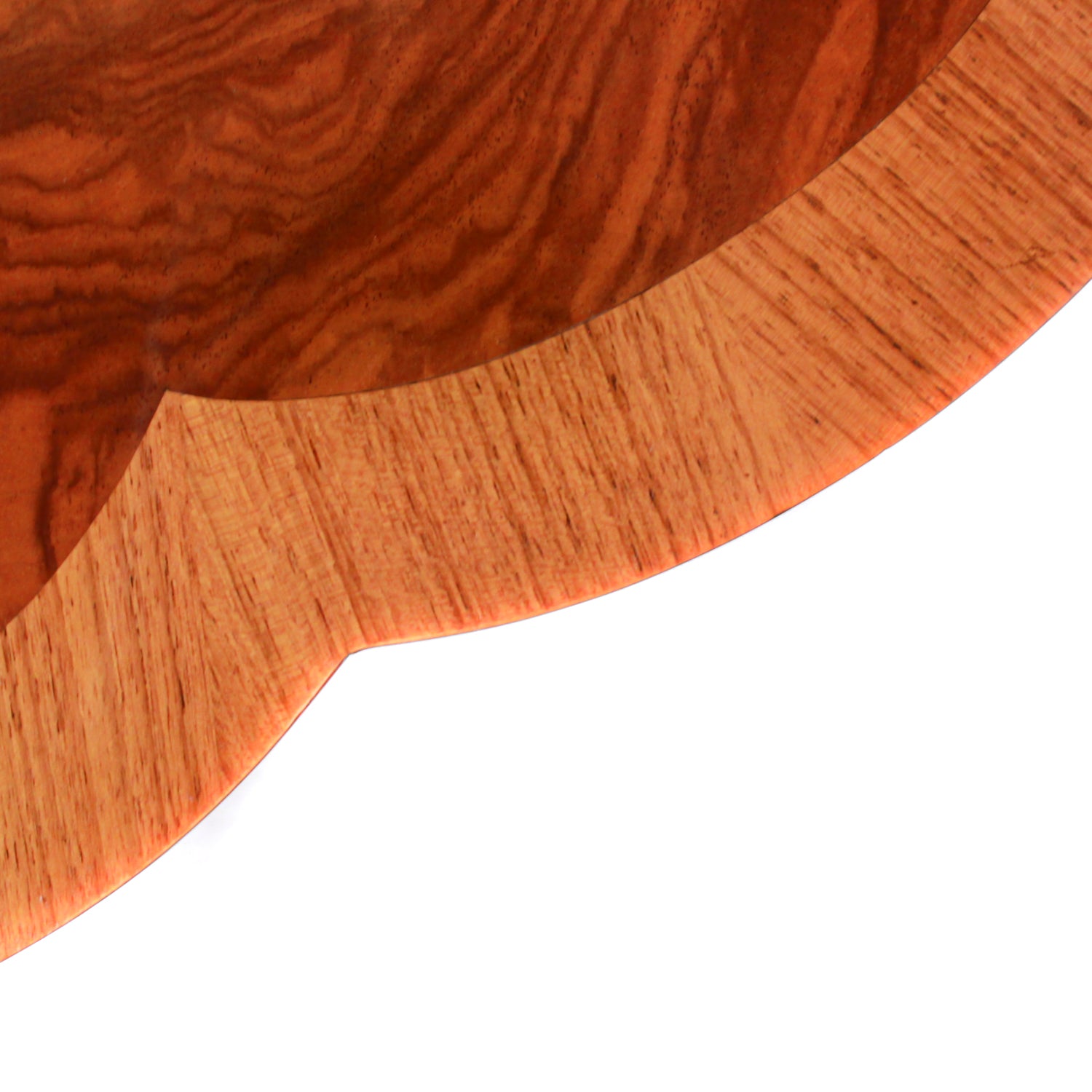 An Art Deco nest of tables in figured and straight grain walnut veneer. Main table with shaped edging set over cross footed base. Four shelved, integral side tables.